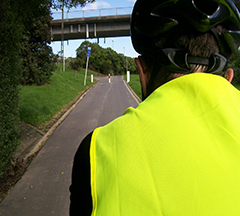 Cycling to office in reflective safety vest